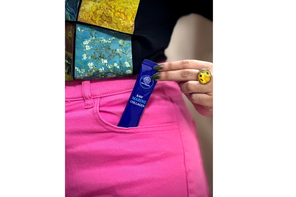 pink jeans holding collagen